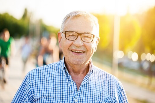 https://www.homecareassistanceoshkosh.com/wp-content/uploads/2018/07/An-Elderly-Man-with-Glasses-Laughing.jpeg